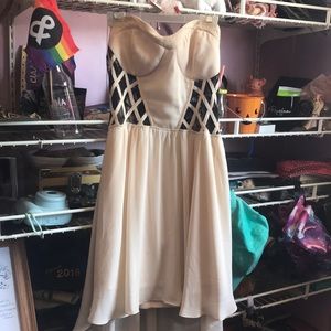 Cute tan dress. Long back, short front. Straples